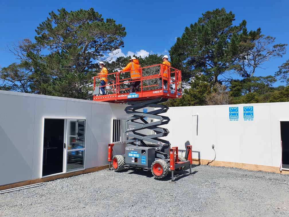 Workers using Access Equipment from Castle Access on a Clear Sunny Day